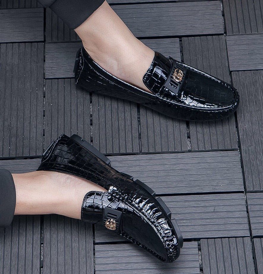 Gucci Black Crocodile-Pattern Loafers — model