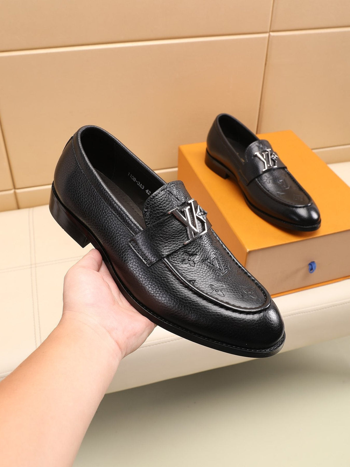 Louis Vuitton Black Embossed Loafers — model