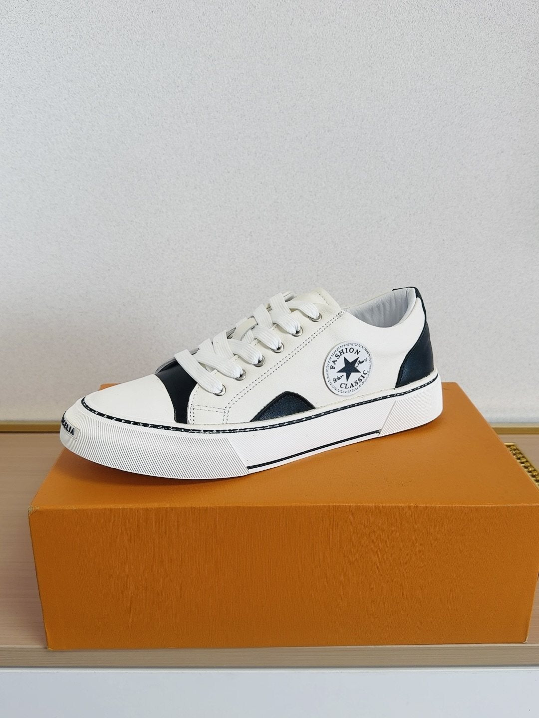 Converse White and Black Low-Top Sneakers — side