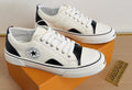 Converse White and Black Low-Top Sneakers — hero