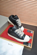 Rick Owens Black Platform Low-Top Sneakers — hero
