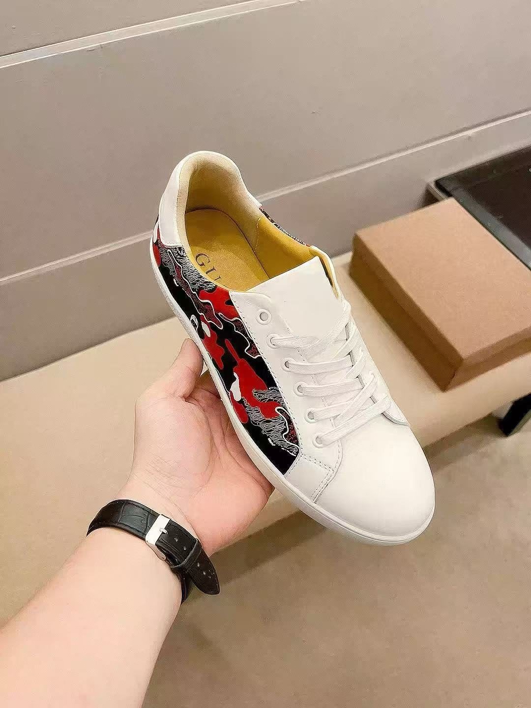 Gucci White Low-Top Sneakers with Black and Red Sides — model