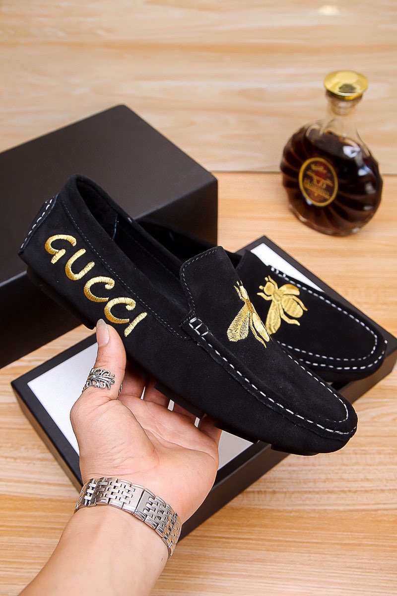 Gucci Black Loafers with Gold Bee Motifs — model