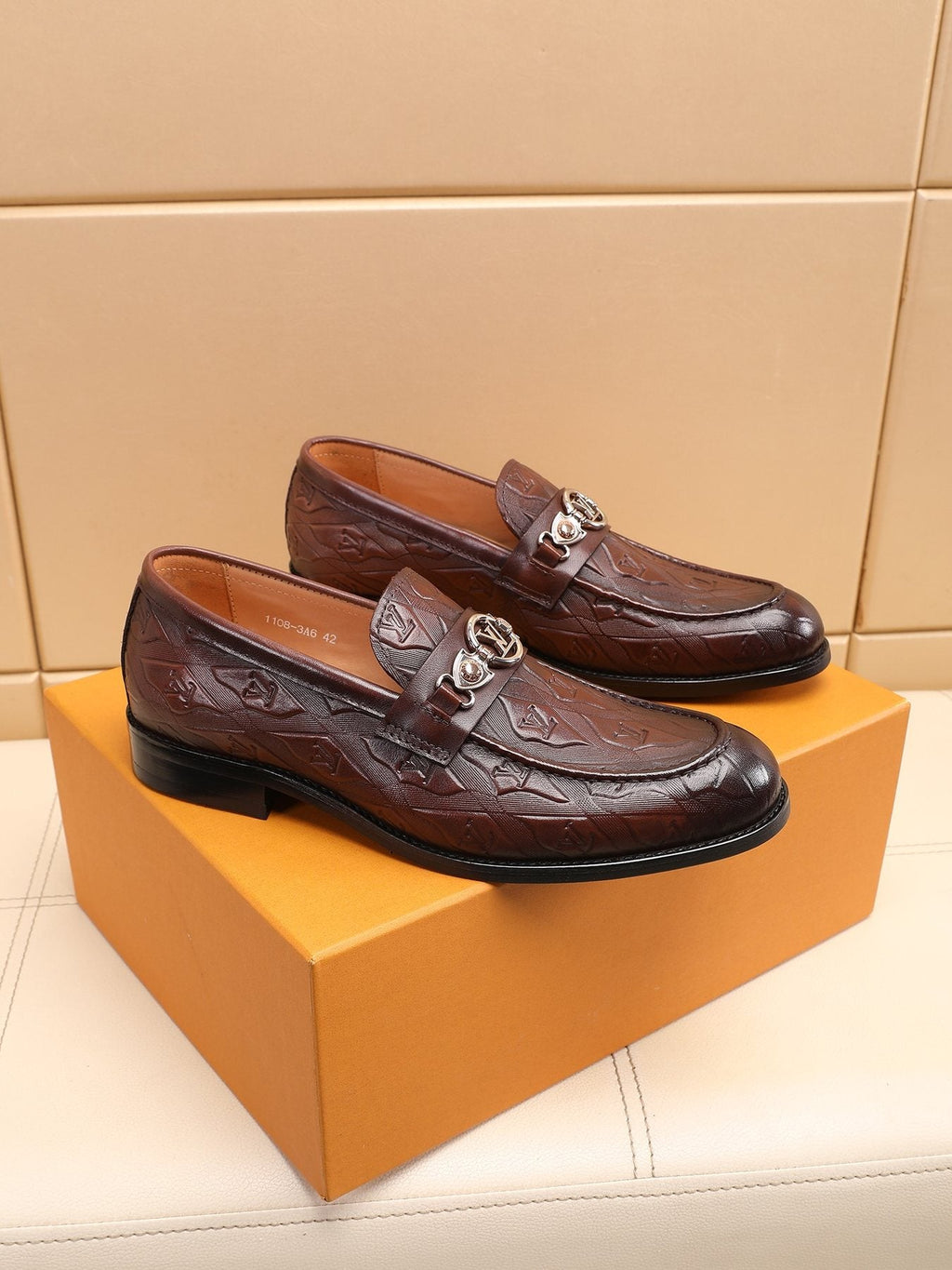 Louis Vuitton Dark Brown Embossed Loafers — front