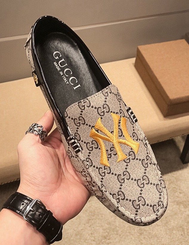 Gucci Beige Patterned Embroidered Loafers — front