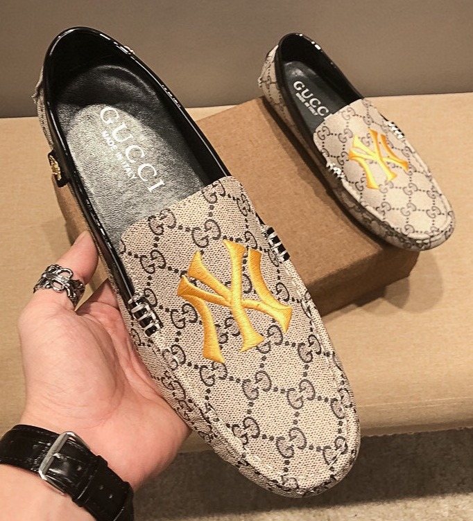 Gucci Beige Patterned Embroidered Loafers — front