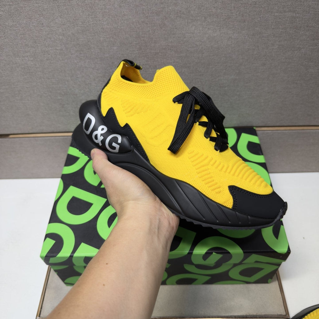 Dolce & Gabbana Yellow and Black Lace-Up Sneakers — model