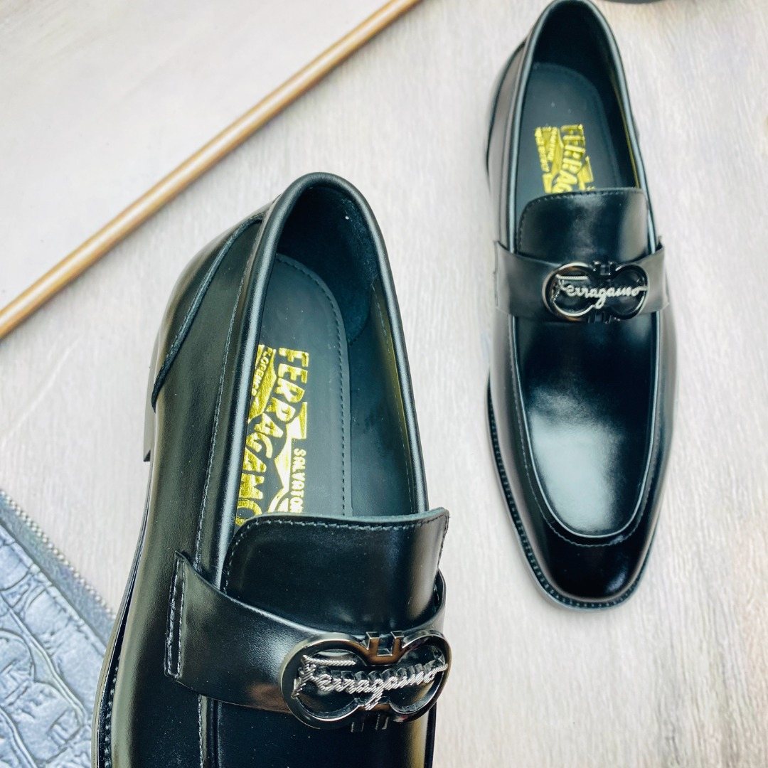 Ferragamo Black Metal-Accent Loafers — detail