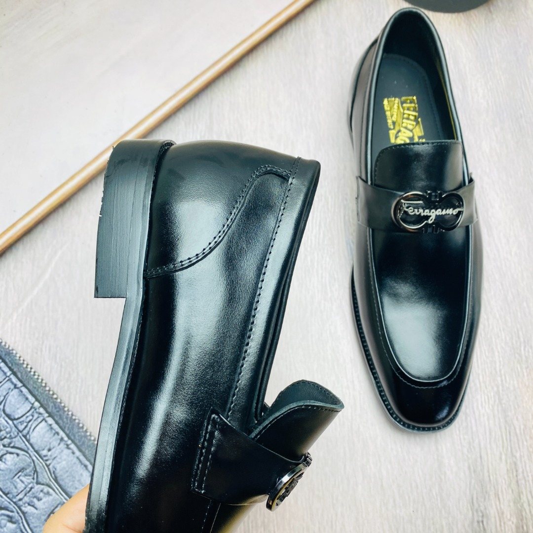 Ferragamo Black Metal-Accent Loafers — side