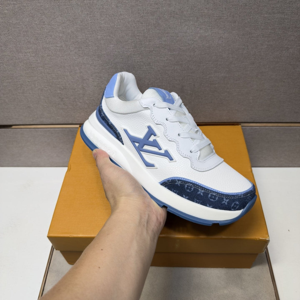 Louis Vuitton Contrast-Trim Low-Top Sneakers — model