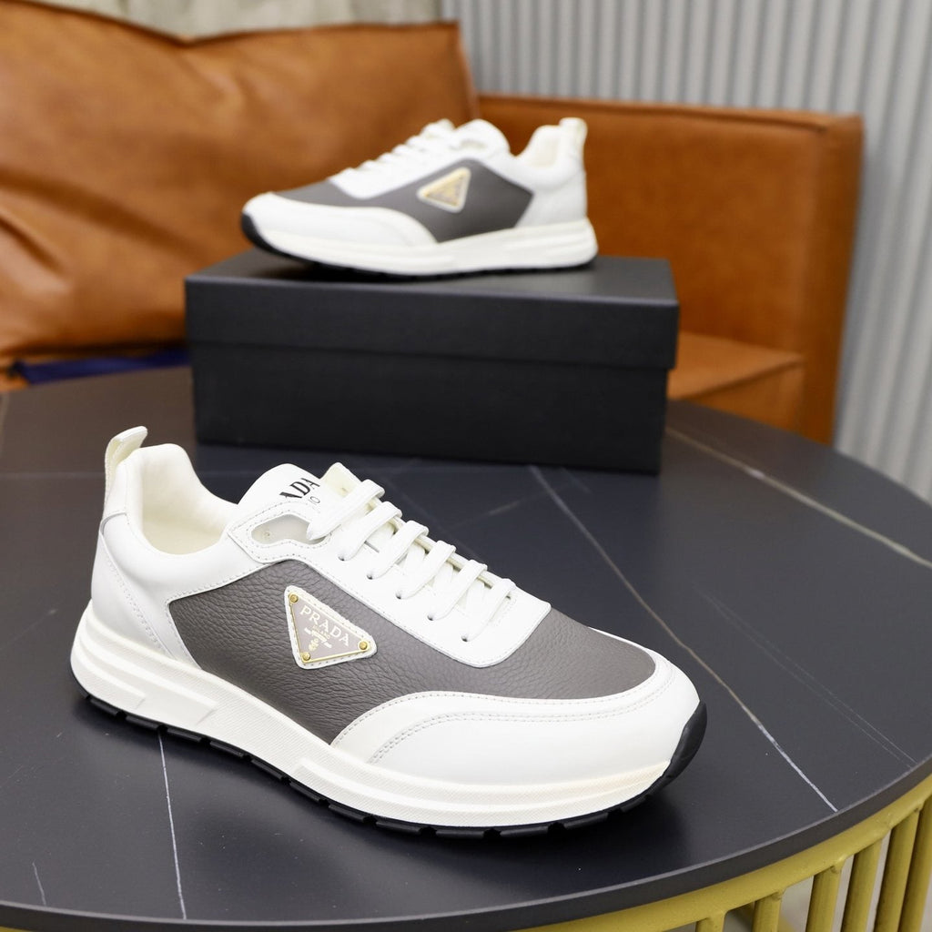 Prada Paneled Lace-Up Sneakers — detail