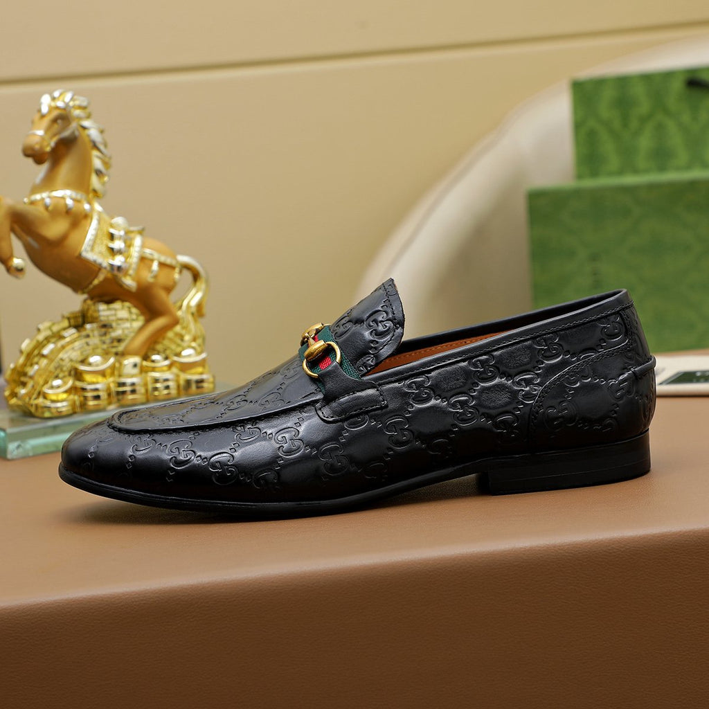 Gucci Patterned Metal-Bit Loafers — side