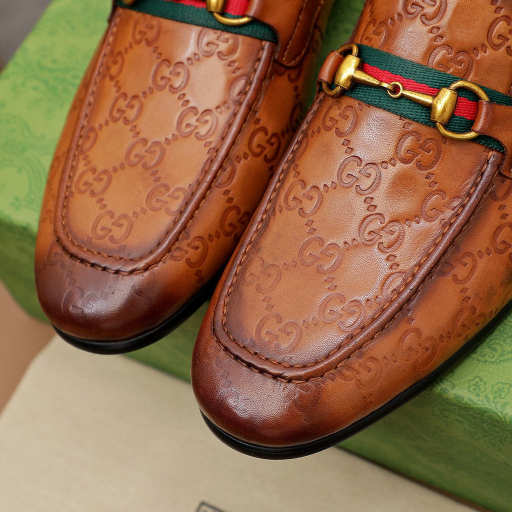 Gucci Patterned Metal-Bit Loafers — detail