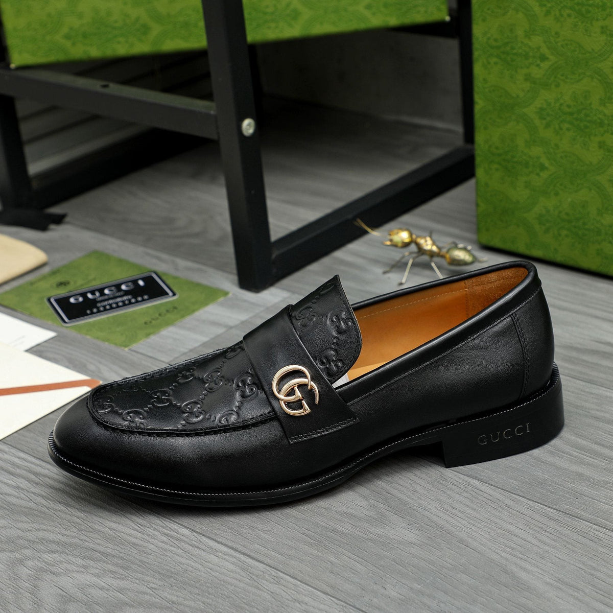 Gucci Black Embossed Loafers with Gold-Tone Detail — side