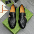 Gucci Black Embossed Loafers with Gold-Tone Detail — front