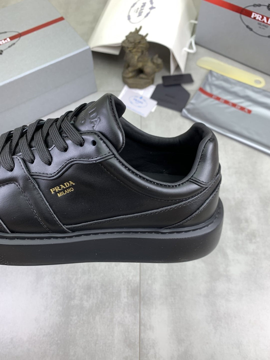 Prada Paneled Low-Top Sneakers — detail