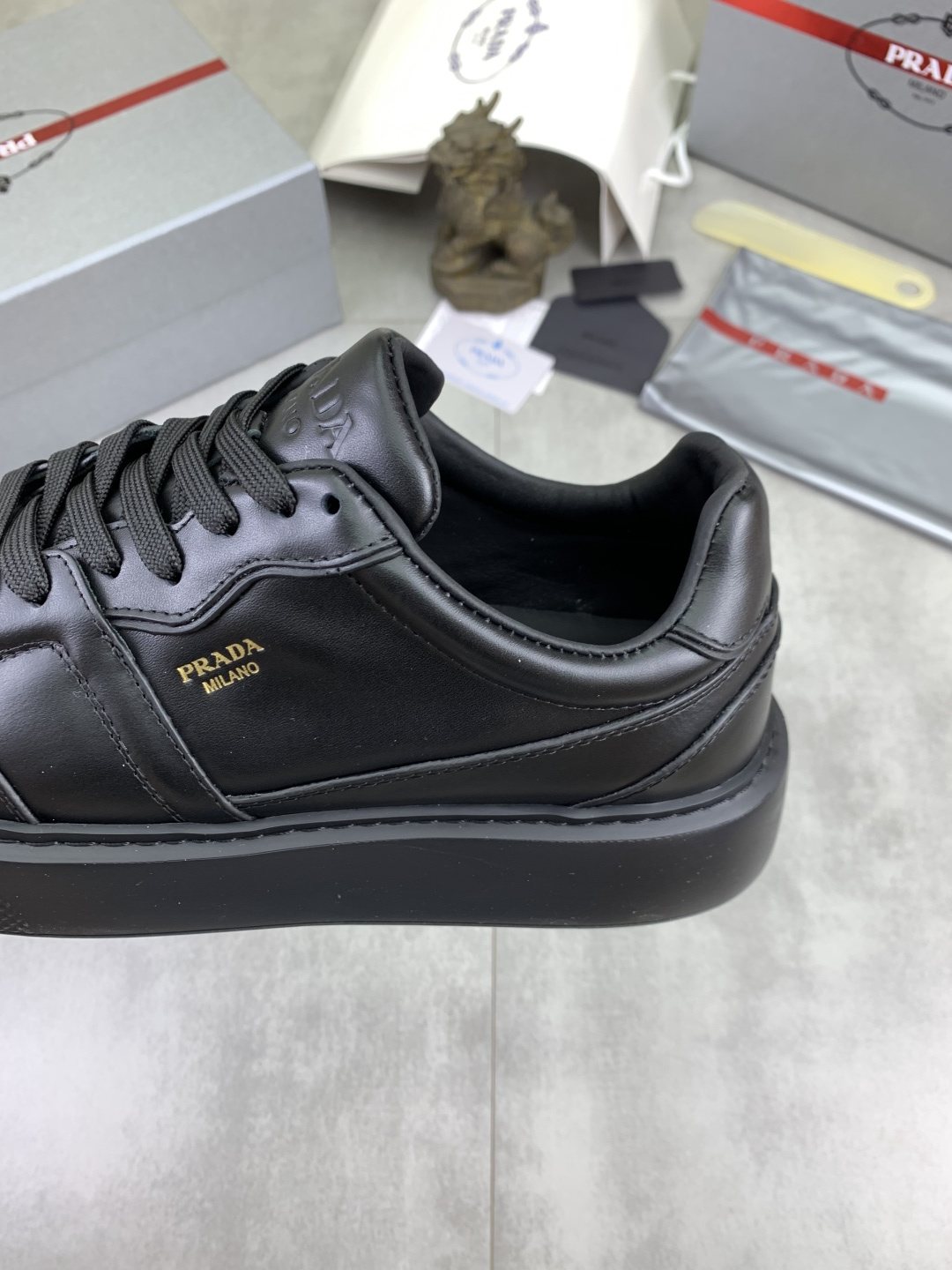 Prada Paneled Low-Top Sneakers — detail