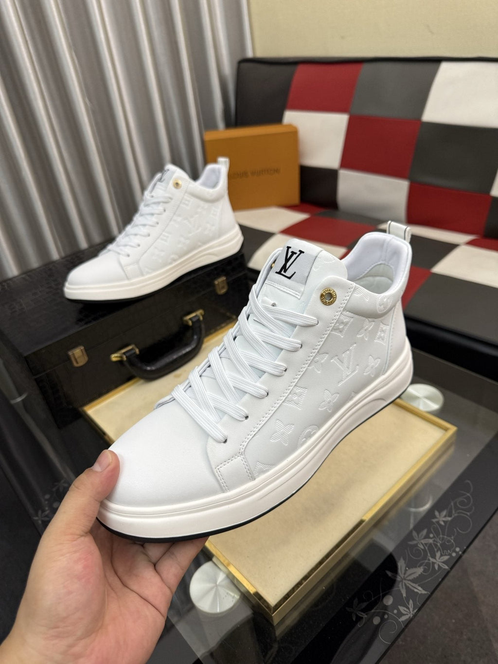 Louis Vuitton Embossed High-Top Sneakers — front