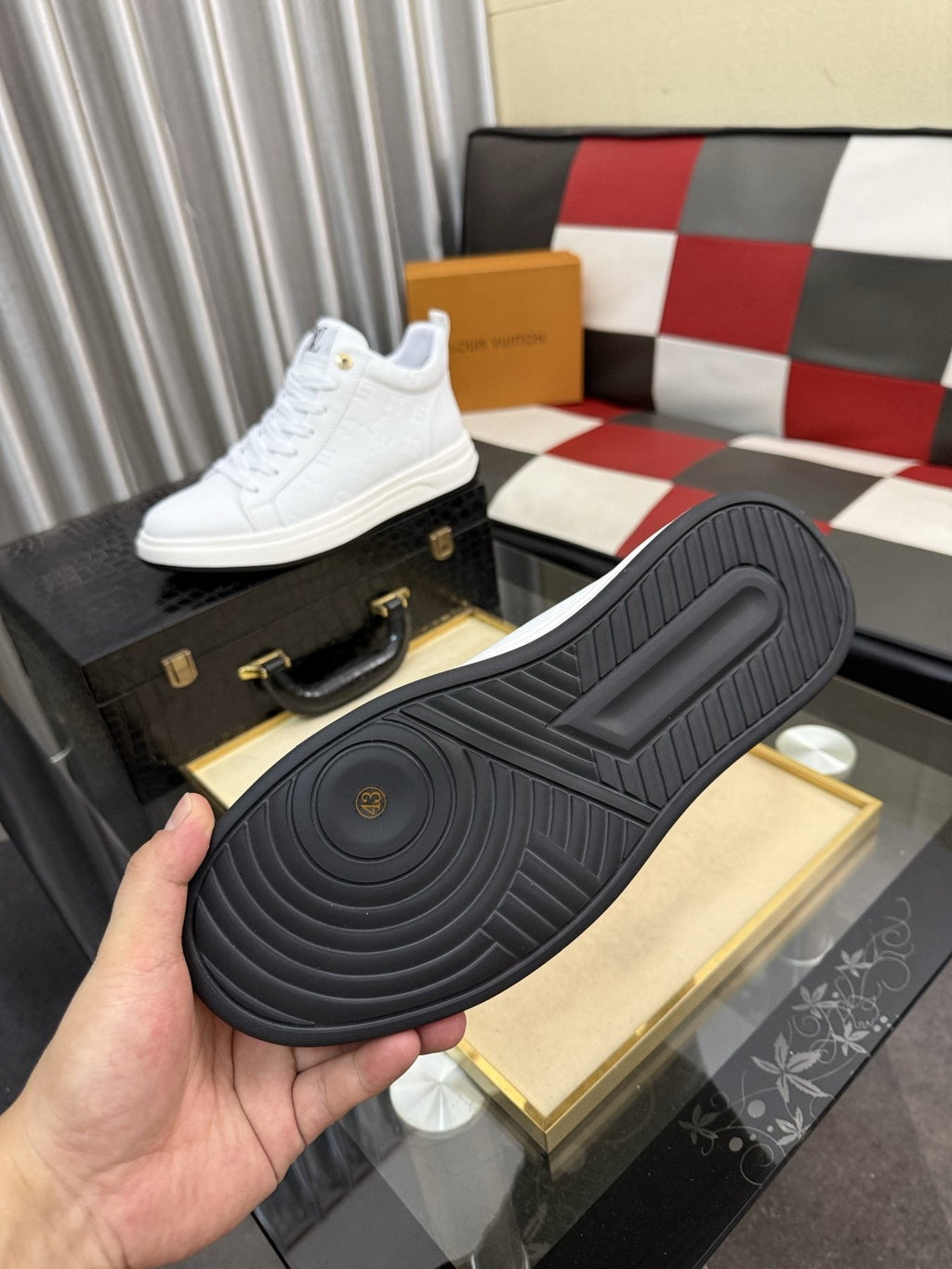Louis Vuitton Embossed High-Top Sneakers — detail