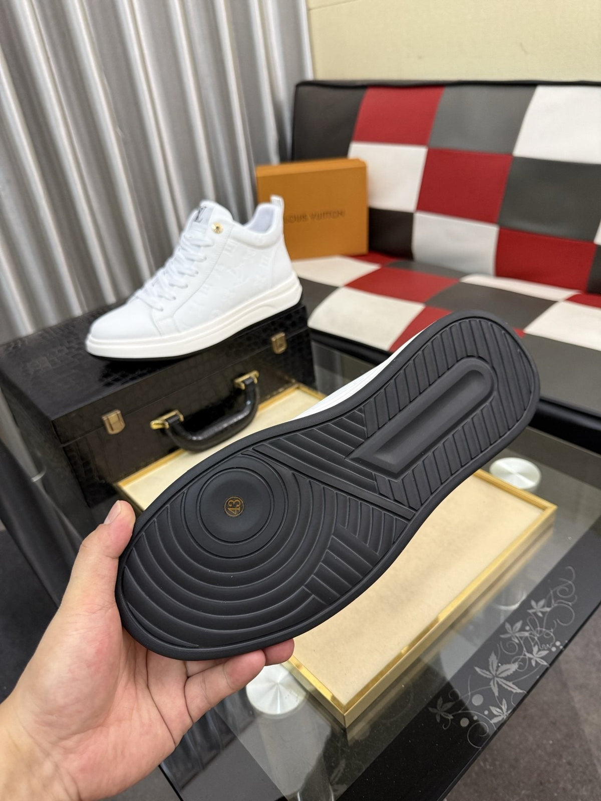 Louis Vuitton Embossed High-Top Sneakers — detail