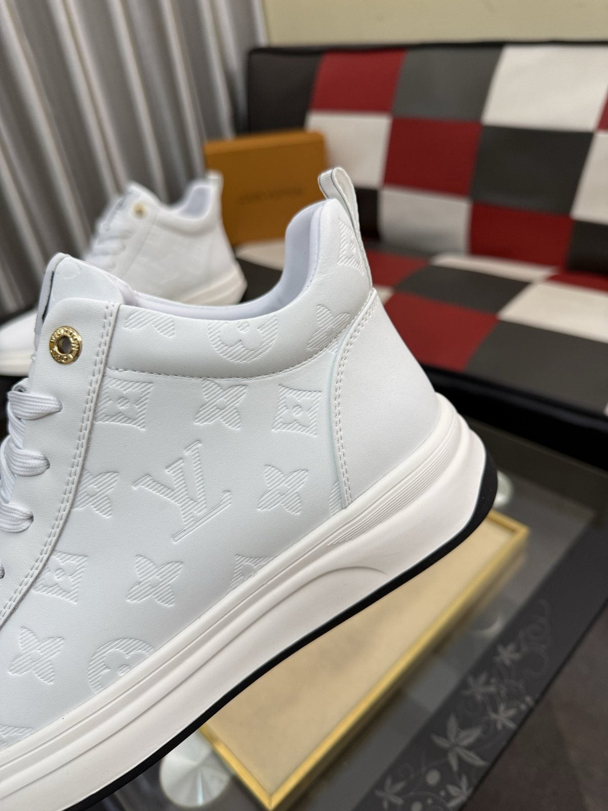 Louis Vuitton Embossed High-Top Sneakers — detail