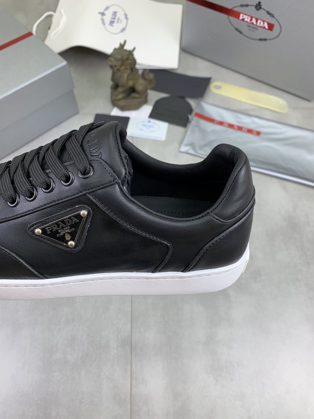 Prada Paneled Low-Top Sneakers — detail