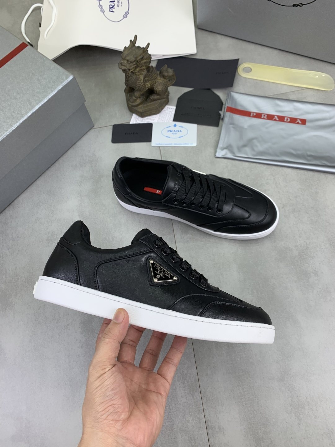 Prada Paneled Low-Top Sneakers — model