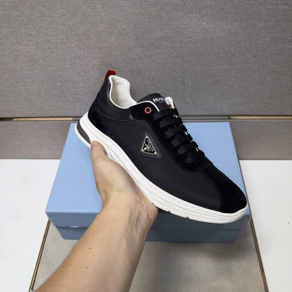 Prada Paneled Low-Top Sneakers — model