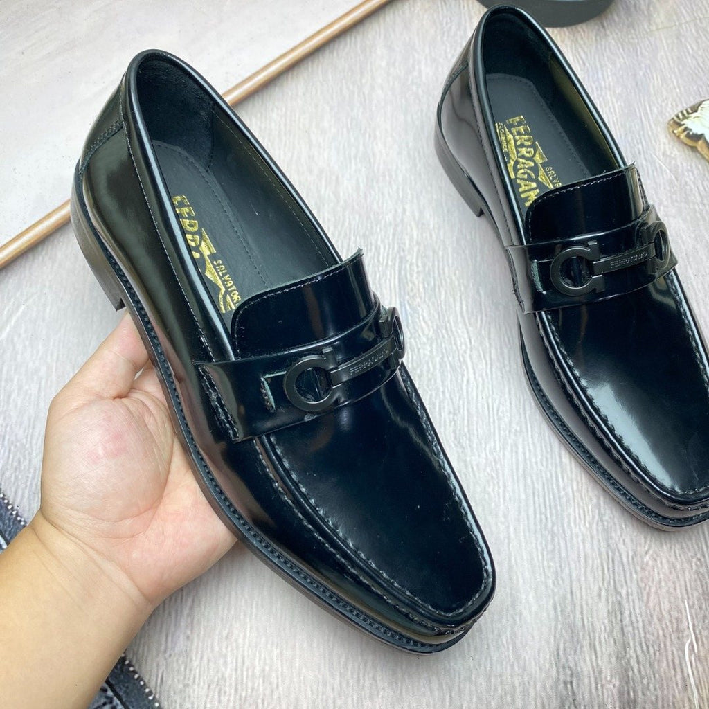 Ferragamo Black Metal-Accent Slip-On Loafers — model
