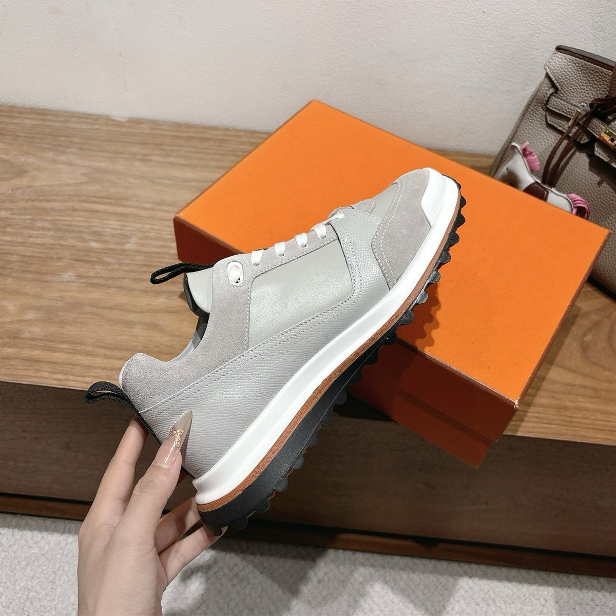 Hermès Paneled Low-Top Sneakers — side