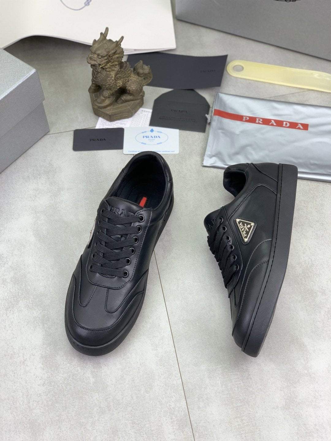 Prada Paneled Low-Top Sneakers — side